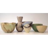 Karin Hessenberg (1944-) five vases, finely carved mottled glazed bodies, two with overlapping