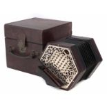 Lachenal & Co. 56 key concertina, with pierced metal end plates fitted to rosewood hexagonal body,