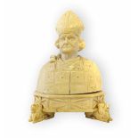 A 19th century Dieppe ivory carved box, the hinged cover in the form of a Bishop wearing a mitre,