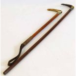 Silver topped walking stick and a riding crop. Condition report: see terms and conditions.