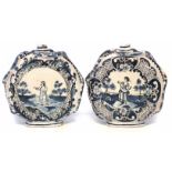 Matched pair of Delft moon flasks, moulded with snakes, painted in blue with figures in gardens,