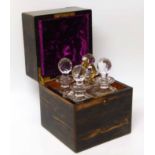 19th century four bottle cut glass decanter set by F. West, one Saint James Street, London in