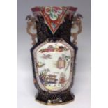 Large Mason's Ironstone vase, with twin dragon handles, decorated with a Chinoiserie landscape