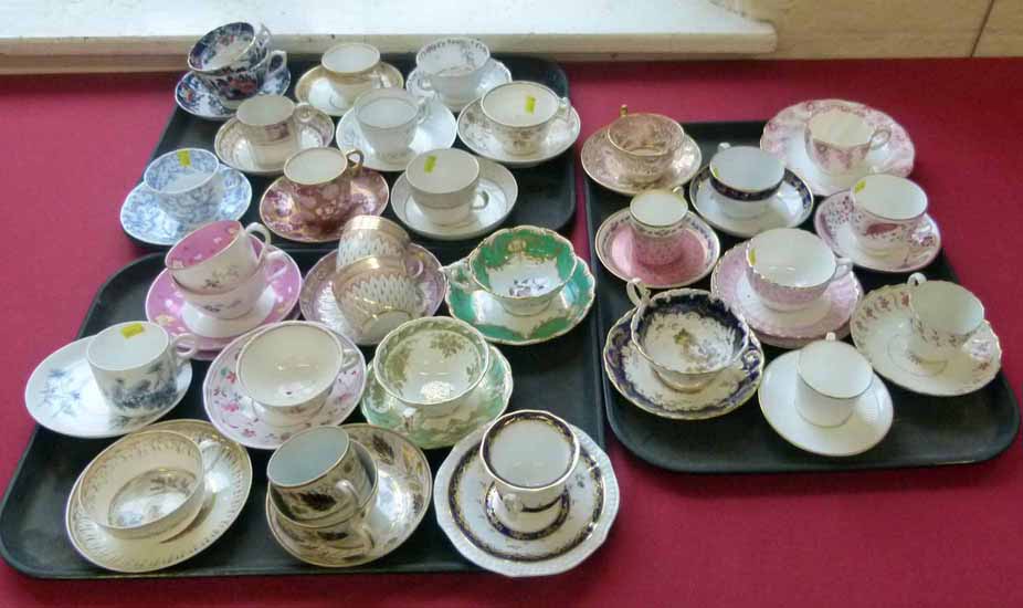 Twenty seven English porcelain cups and saucers / trios early 19th century and later. No condition