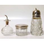 Three silver topped glass jars. No condition reports for this sale