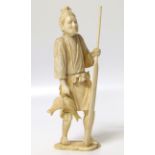 Ivory Chinese carved figure of a fisherman (damage to left arm). No condition reports for this sale