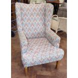 Winged fireside chair No condition reports for this sale