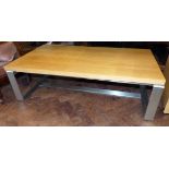 Solid oak coffee table on brushed steel base. No condition reports for this sale