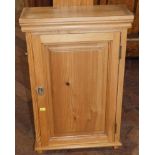 Pine wall cabinet with single door. No condition reports for this sale