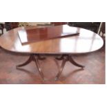 Regency style twin pedestal mahogany table with single leaf. No condition reports for this sale