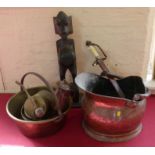 Two brass jam pans and various other metalware. Also African carved figure. No condition reports for