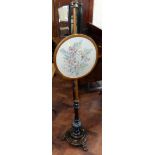 Victorian mahogany pole screen with 40cm dia screen and embroidered with wild flowers standing on