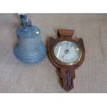 Brass fire bell and an aneroid barometer. No condition reports for this sale