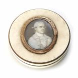 A George III ivory patch box with miniature portrait of a gentleman. 7.5cm diameter. Condition