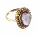Amethyst and seed pearl oval cluster 15ct yellow gold ring. The central oval amethyst approx. 15mm x