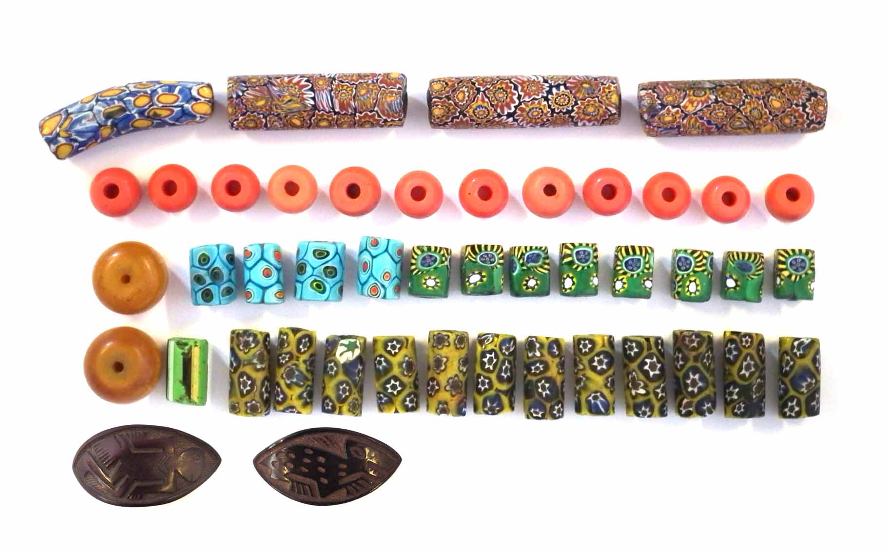 Collection of twenty nine African trade Venetian millefiori glass beads, also fourteen red and amber