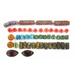 Collection of twenty nine African trade Venetian millefiori glass beads, also fourteen red and amber