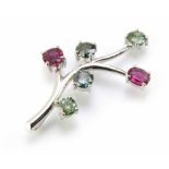 Green diamond and ruby 6 stone 18ct white gold stylized spray pendant, the 4 green/blue-green