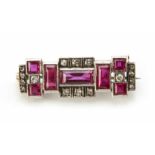 Art Deco diamond and ruby white gold and platinum brooch. 7 rectangular and square stepped cut
