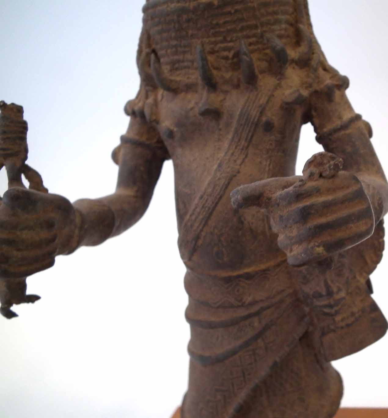 Benin bronze warrior, modelled standing holding the remnants of a spear with mask at his side, 34. - Image 4 of 11