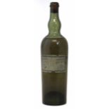 Chartreuse liqueur, the label reading 'Liqueur Fabrique a la Gde Chartreuse Fabrique' the bottle