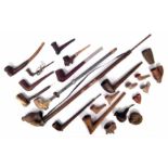 Twenty two African pipes, mainly North and Central Nigeria, carved, wood, bone, clay and metal, also