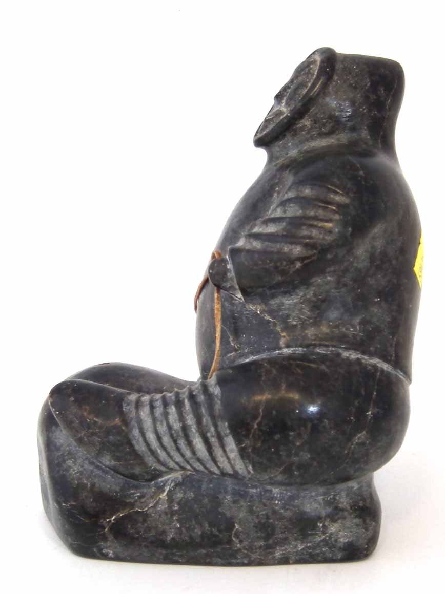 Carved soapstone figure probably Isah Sheeq, depicting an Inuit sitting on a rock, E9774 to base, - Image 3 of 5