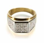 A diamond set 18ct gold signet ring, square head and shoulders, floodlight set. Total of 27 round