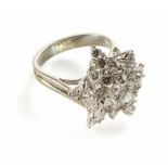 A diamond fancy cluster 18ct white gold ring. Total of 27 round brilliant cut diamonds, centre