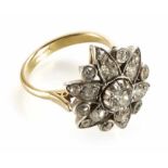Diamond flower head ring, total of 19 round old cut diamonds, centre diamond calculated weight of