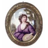 English enamel oval plaque circa 1780 probably Bilston, painted with a lady glazing skyward