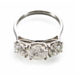 Diamond 3-stone platinum ring, 3 round brilliant cut diamonds, centre diamond approx. 2 carats, 2