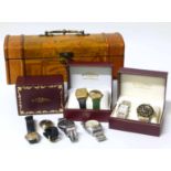 Casket containing four Rotary gold plated gent's wristwatches and assorted base metal watches. No