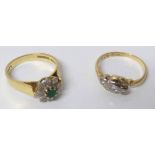 Two 18ct gold and diamond set dress rings No condition reports for this sale.