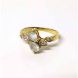 Aquamarine and diamond set 16ct gold ring. No condition reports for this sale.
