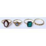 Four 9ct gold dress rings No condition reports for this sale.