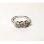 Diamond triple cluster 14ct white gold ring, total diamond weight of approximately 1ct. No condition