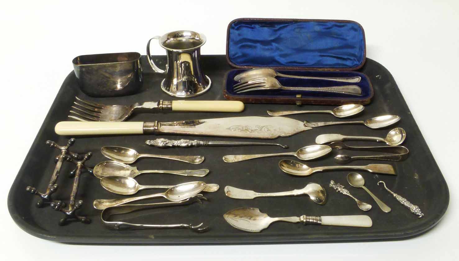 A quantity of small silver flatware comprising a boxed fork and spoons set (Victorian), seven