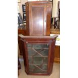 Two 19th century mahogany corner cupboards. No condition reports for this sale.