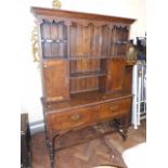 Oak dresser- Early 20th century No condition reports for this sale.