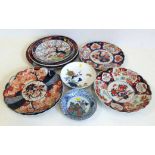 Seven Japanese Imari chargers and two dishes. No condition reports for this sale.