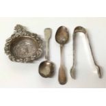 A continental silver strainer together with a pair of silver sugar tongs, silver teaspoon (AF)