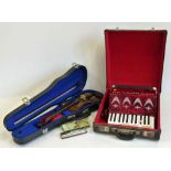 German violin in case and an accordion and a Hohner Echo harpmouth organ. No condition reports for