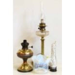 Two brass oil lamps (one electric lamp) No condition reports for this sale.