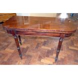 19th century mahogany fold-over tea table. No condition reports for this sale.