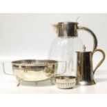 4 silver plated items comprising a glass lidded jug, two handled bowl, water jug and half fluted