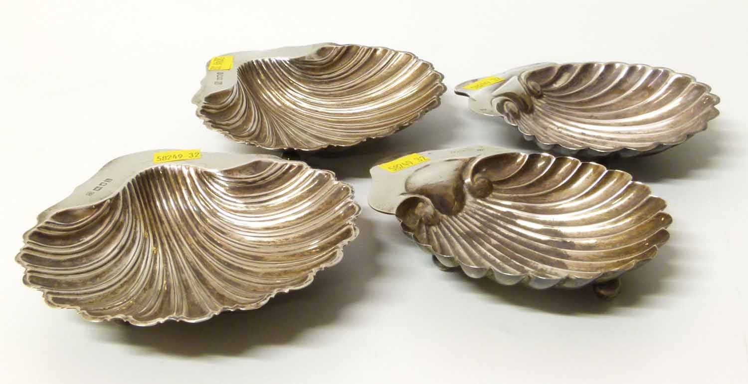 Two pairs of silver shell butter dishes, one pair by Walter & Charles Sissons, 1903. Total weight