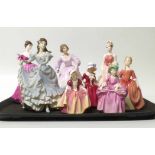 Three Coalport "dancing ladies"and Five Royal Doulton figures No condition reports for this sale.