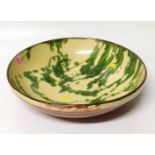 Splatter decorated ceramic bowl. No condition reports for this sale.