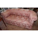 Edwardian sprung and upholstered Chesterfield settee. No condition reports for this sale.